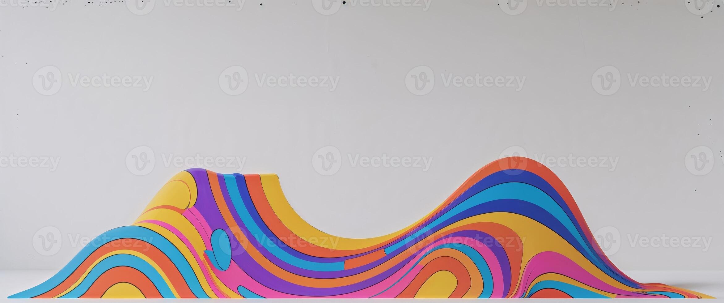 A colorful wave sculpture on a white surface photo