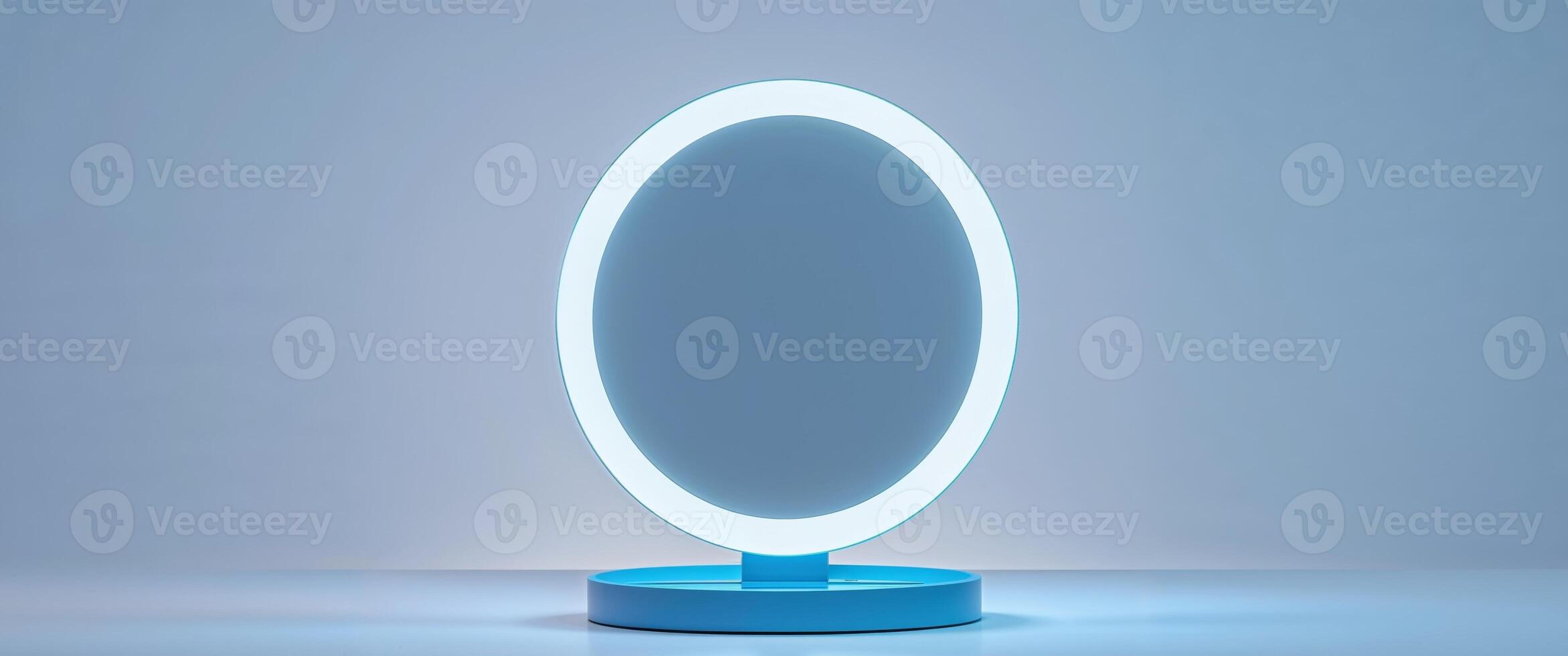 Modern blue lighted vanity mirror on a studio backdrop. photo