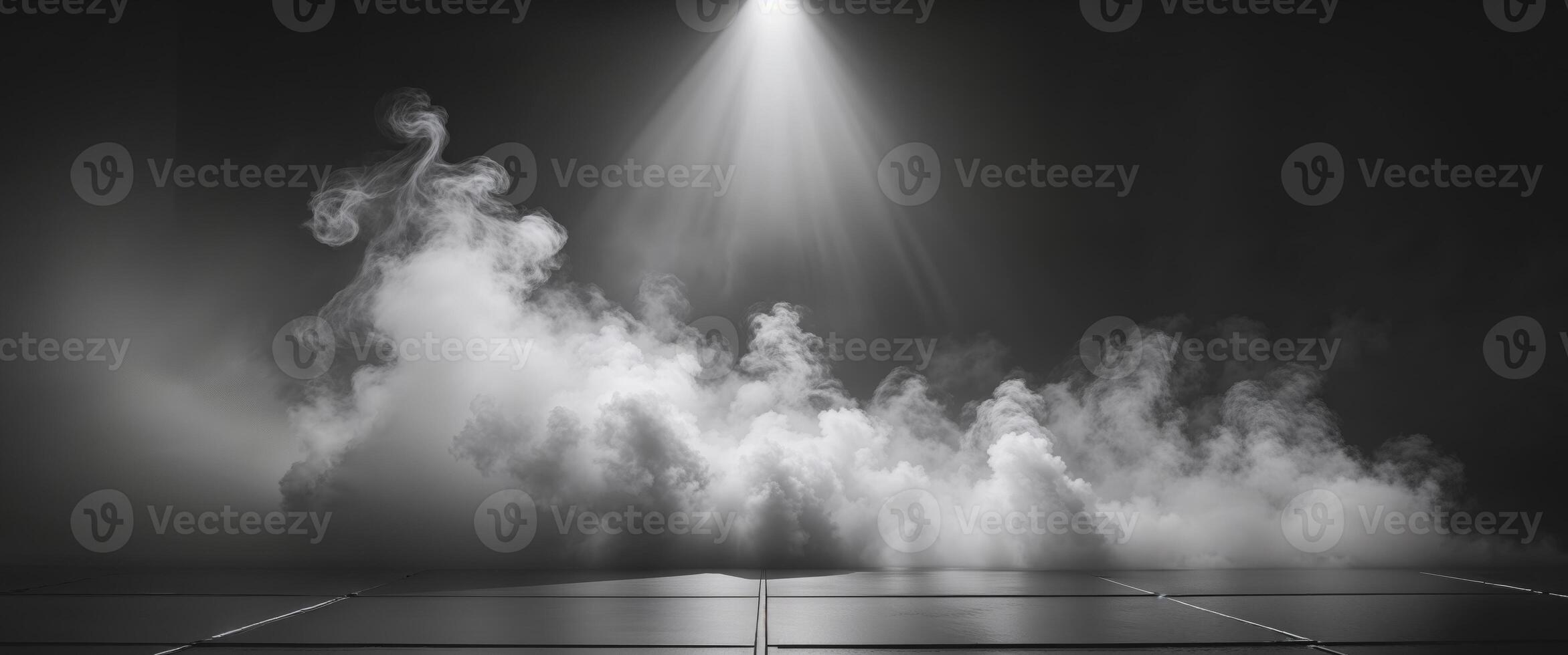 Black and white photo of smoke coming out of a spotlight