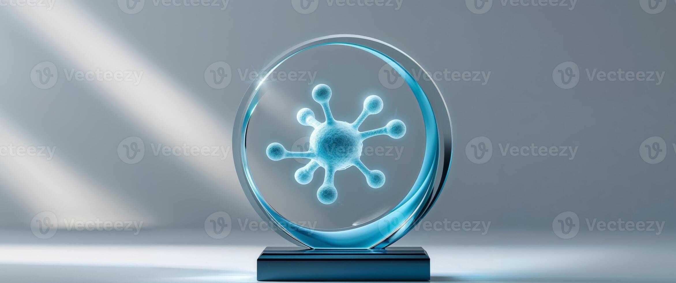A glass trophy with a blue virus on it photo