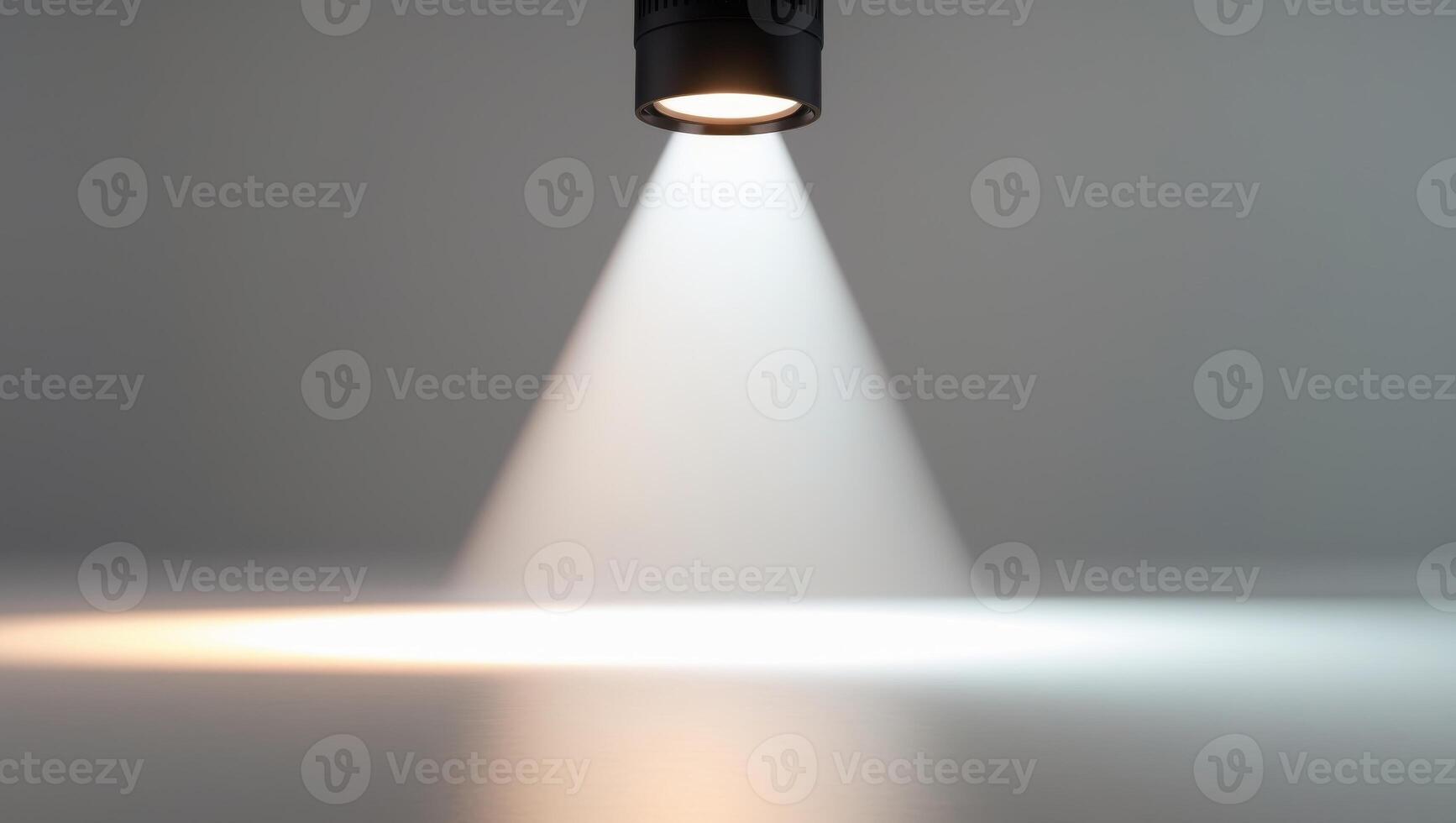 A spotlight is shining on a white surface photo
