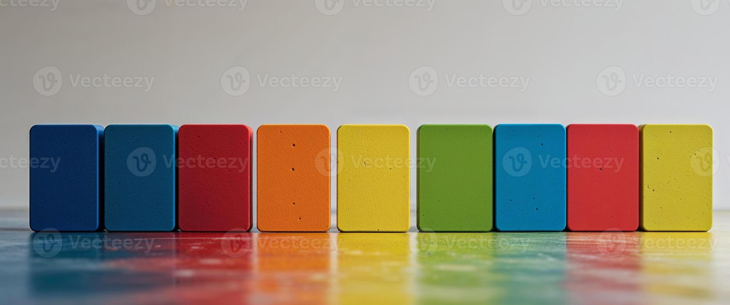 A row of colorful blocks on a table photo