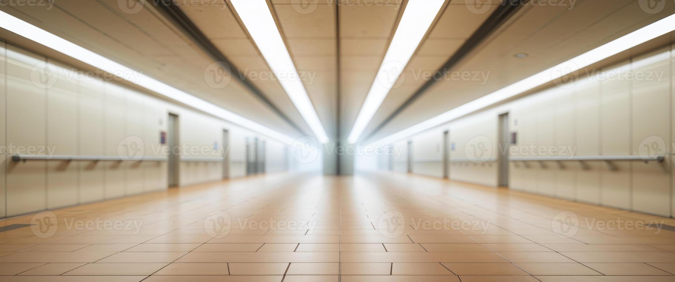 Modern subway station with blurred ceiling view and textured floor. photo
