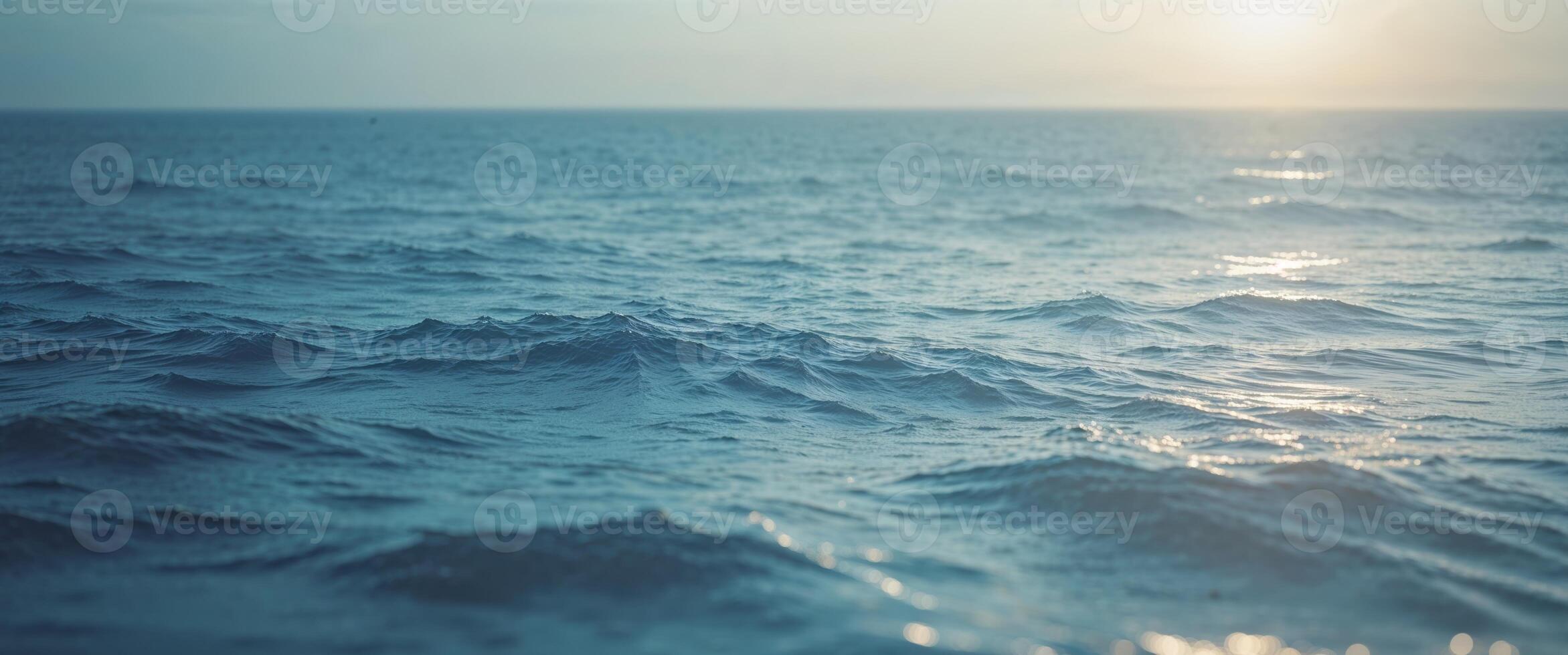 Deep Blue Ocean Background with Soft Sunlight Effects. photo