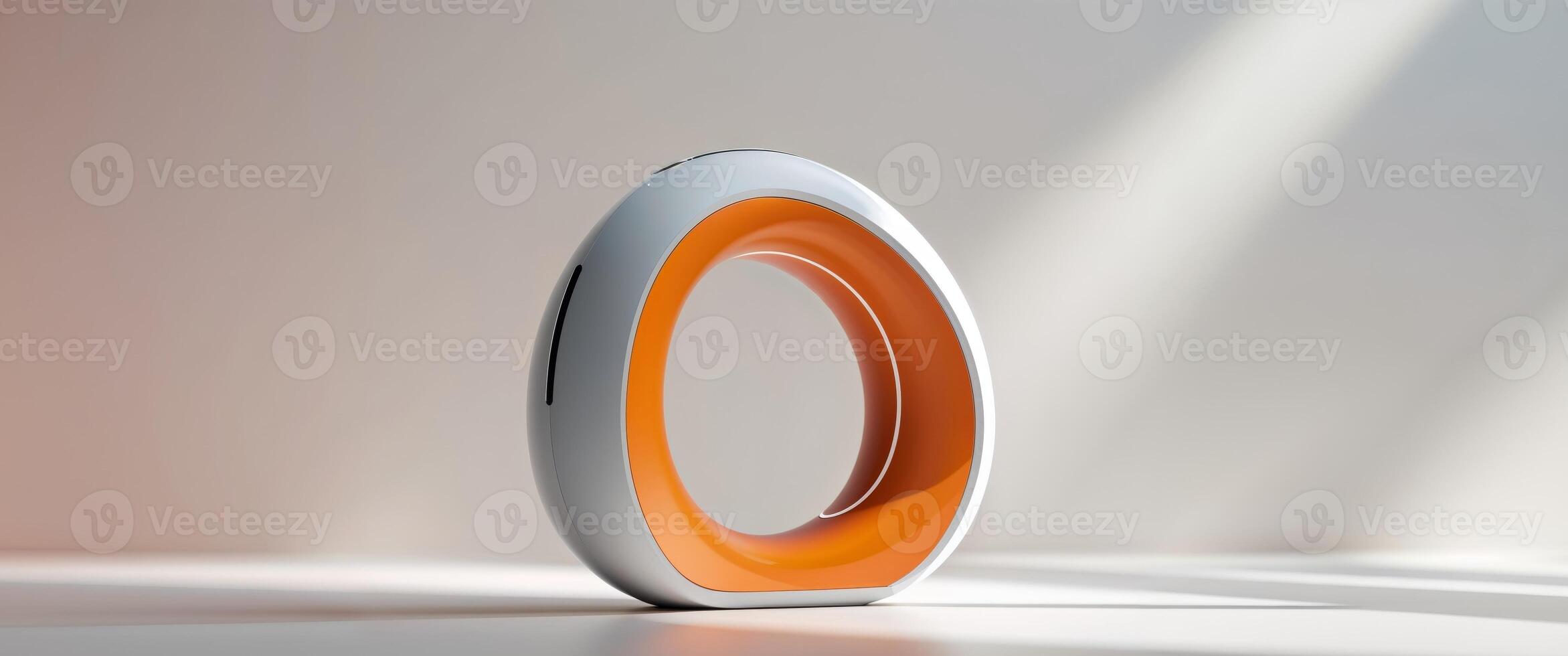A ring shaped object with an orange and white design photo