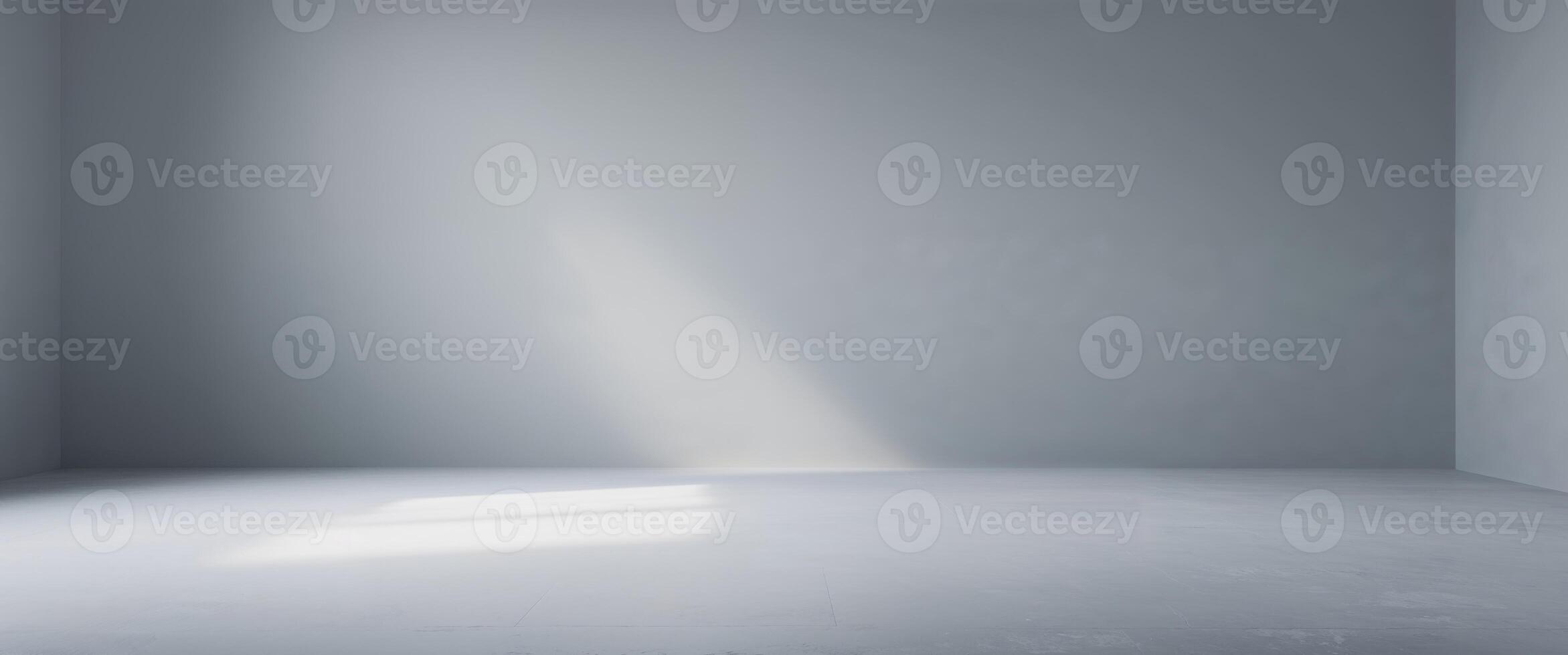Empty room with white walls and light coming in from the window photo