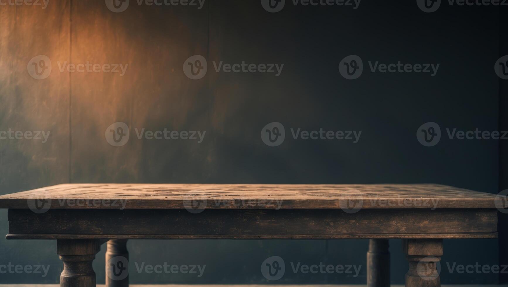 An empty table in front of a dark wall photo