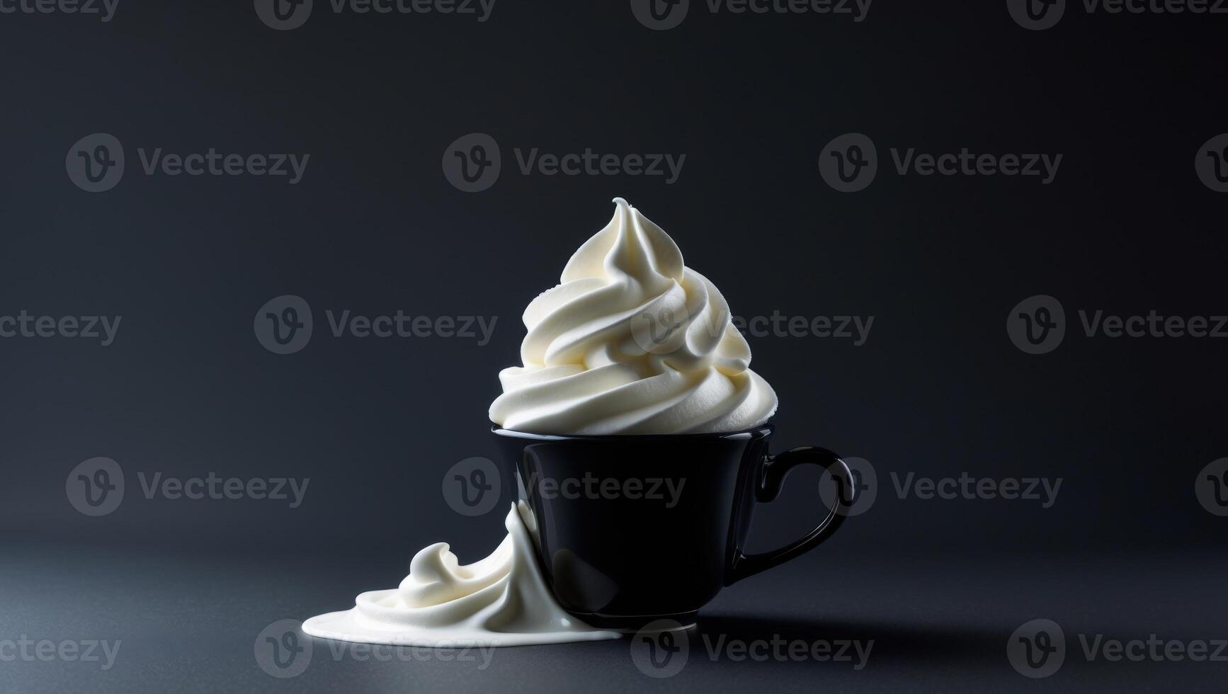 A cup of whipped cream in a black cup photo
