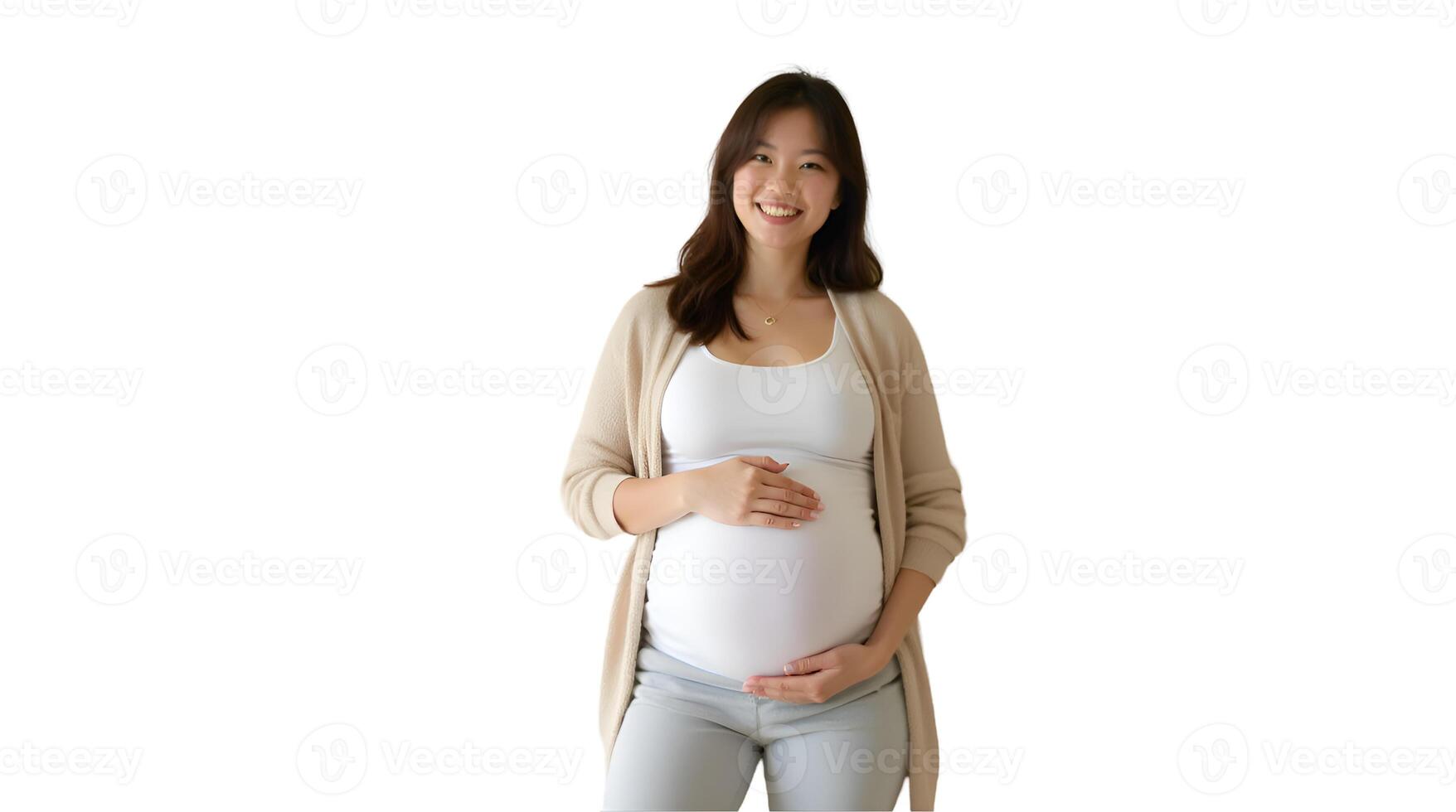 A pregnant woman is standing in front of a white background photo