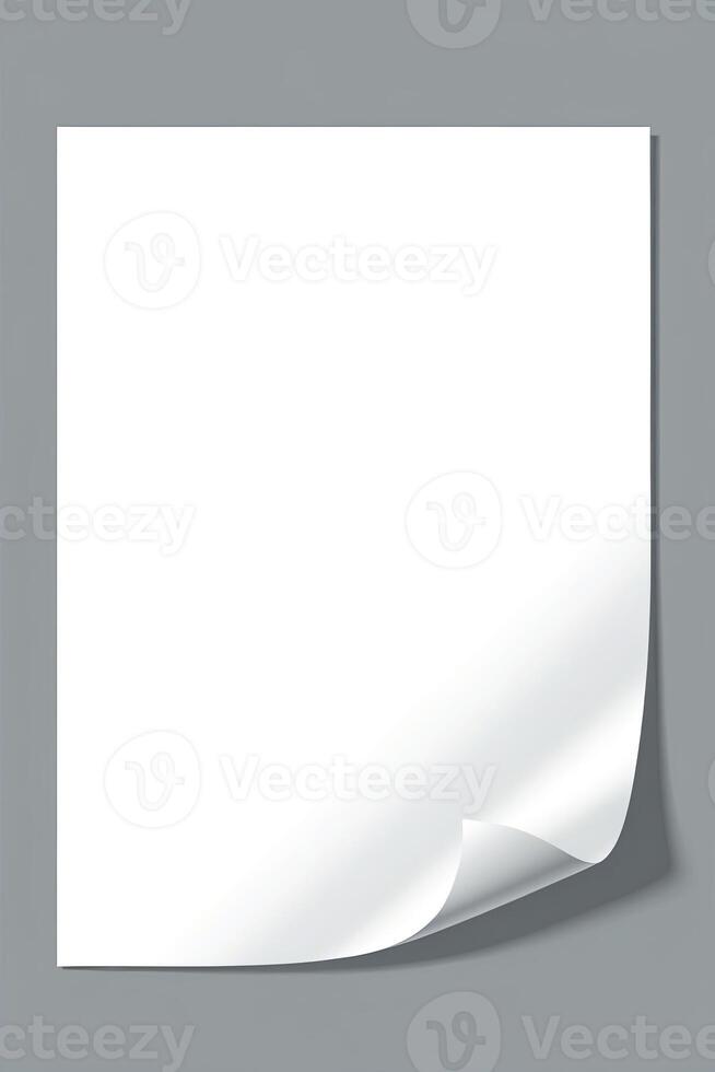 Blank White Sheet of Paper with Curled Corner on Gray Background photo