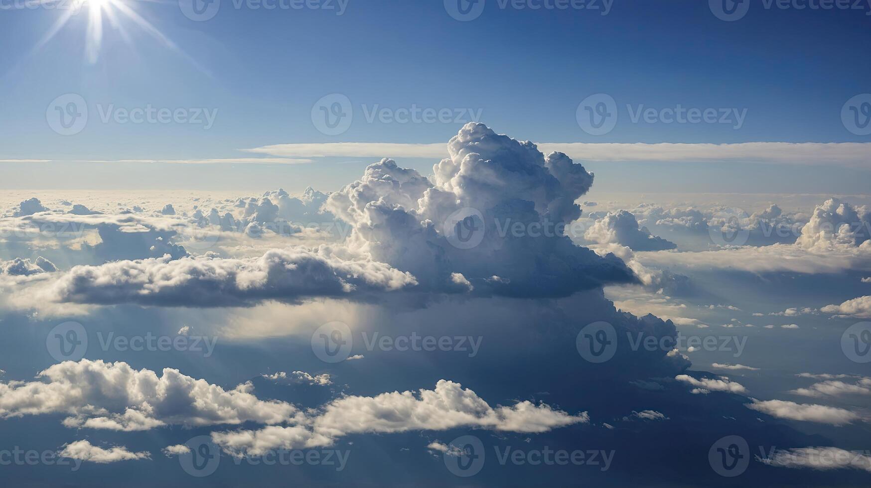 Aerial View of Cumulus Clouds and Sun Shining Through the Atmosphere photo