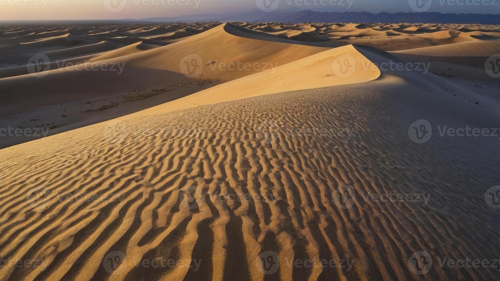 Exploring Majestic Desert Sand Dunes with Wavy Patterns Under Sunny Skies photo