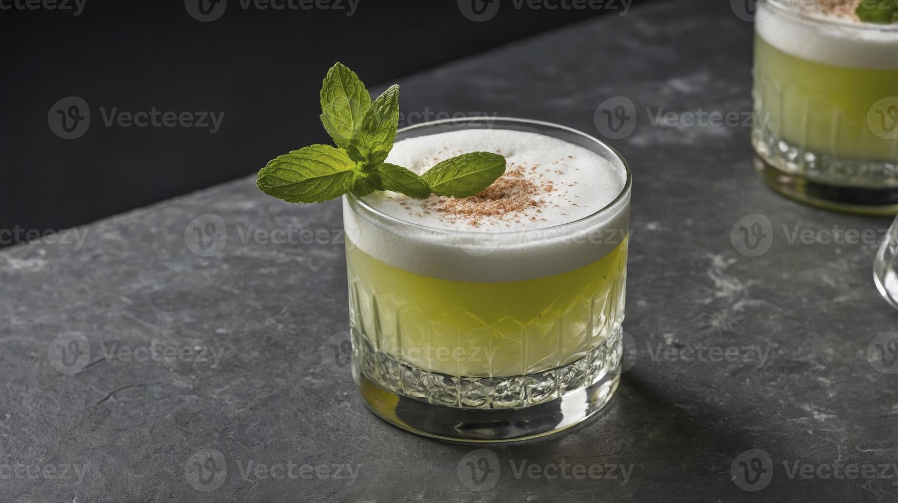 Refreshing Cocktail with Mint Sprig on Gray Surface Background photo