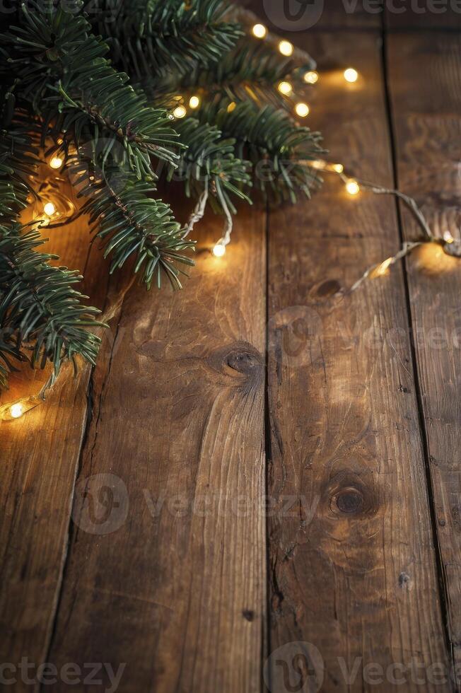 Decorating Rustic Wooden Surface with Christmas Lights and Evergreen Branches photo
