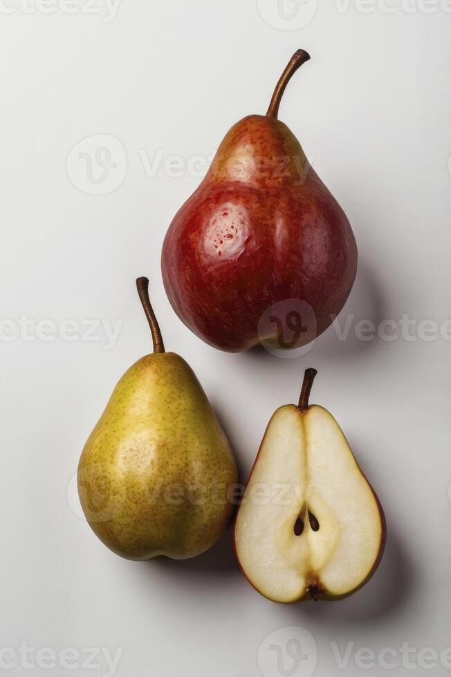 Three Pears Red Yellow and Cut Pear Still Life Arrangement photo