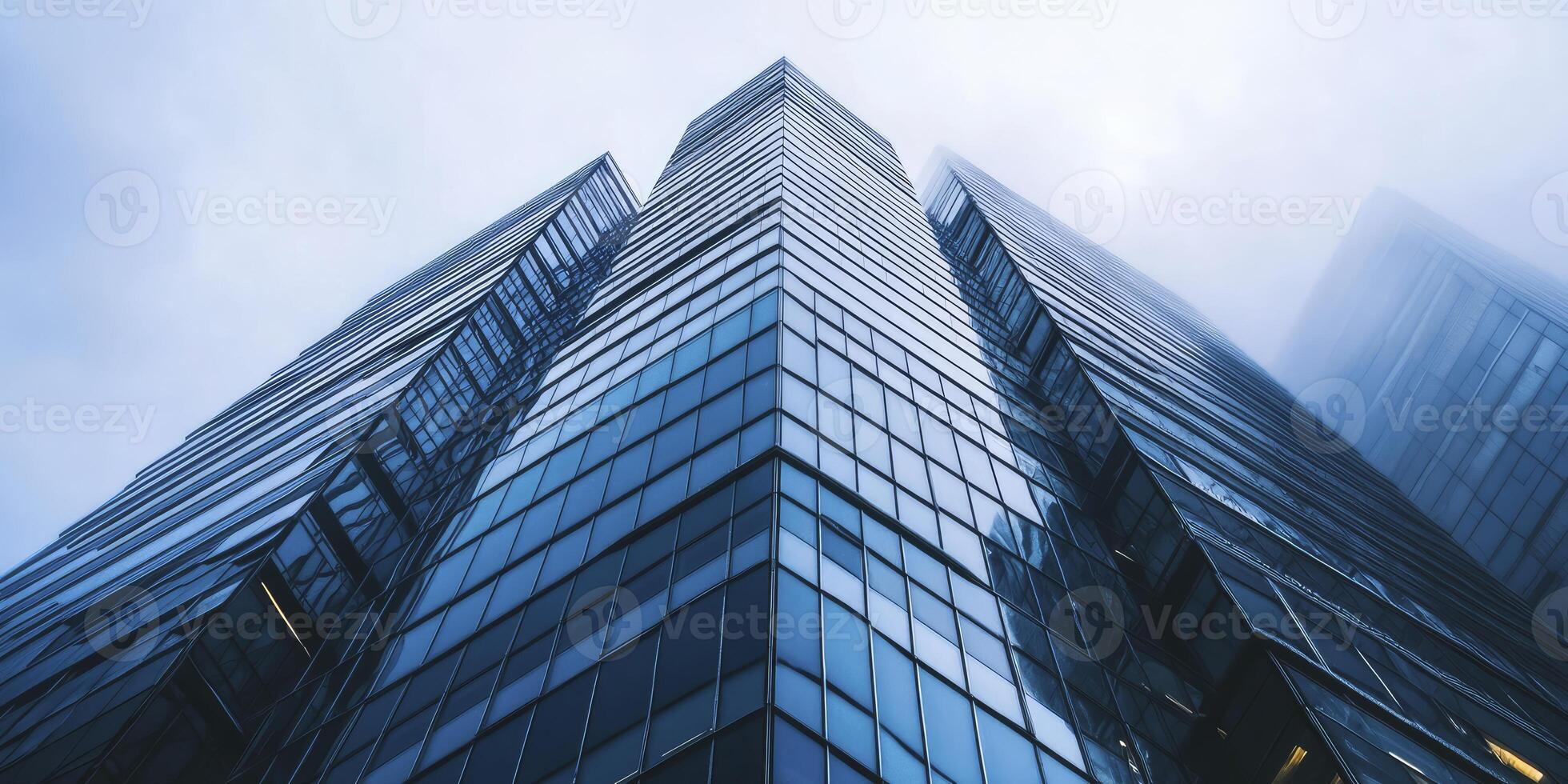 Skyscrapers Reaching Towards the Cloudy Sky in an Architectural Upward Perspective photo