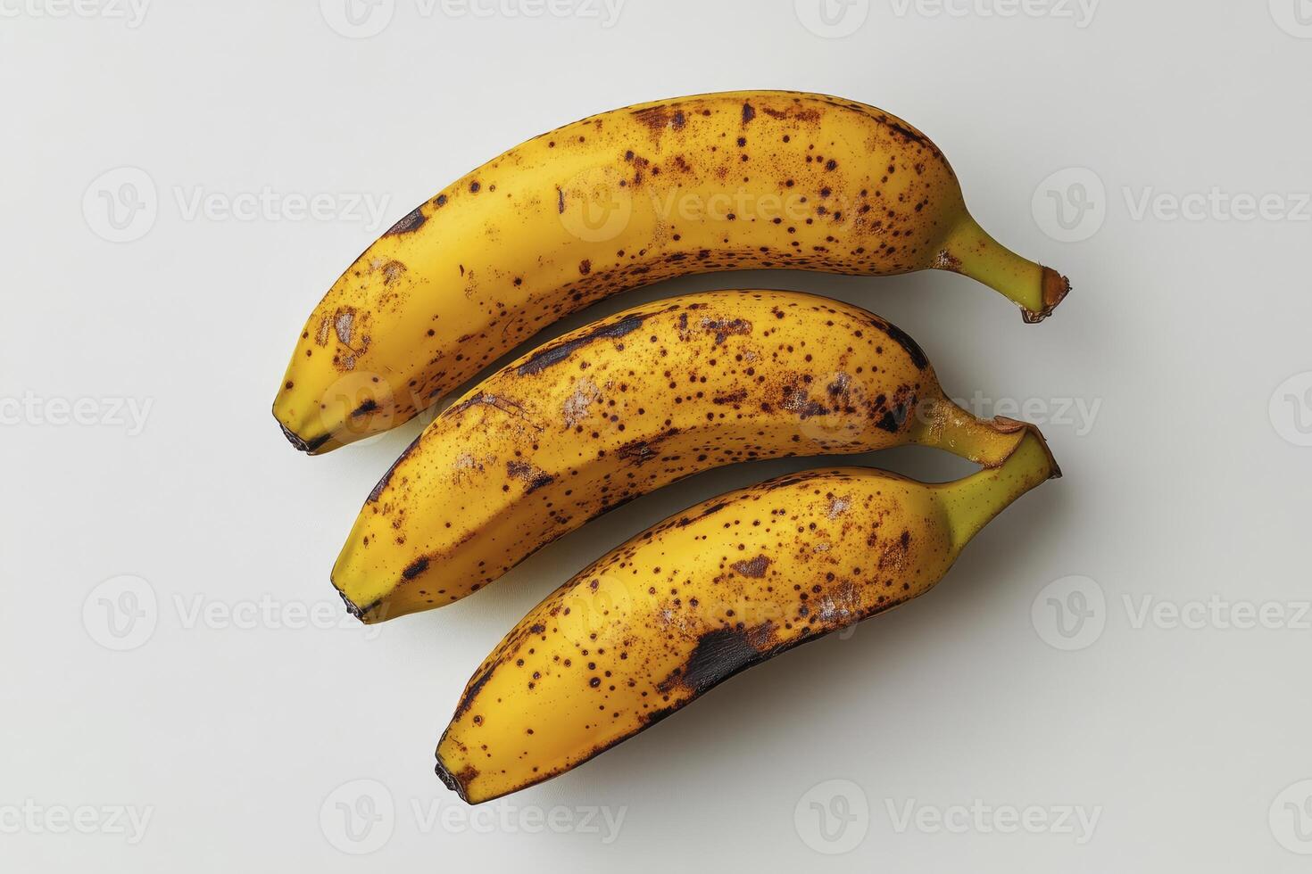 Overripe Bananas on White Background Ready for Baking or Cooking Healthy Meals photo