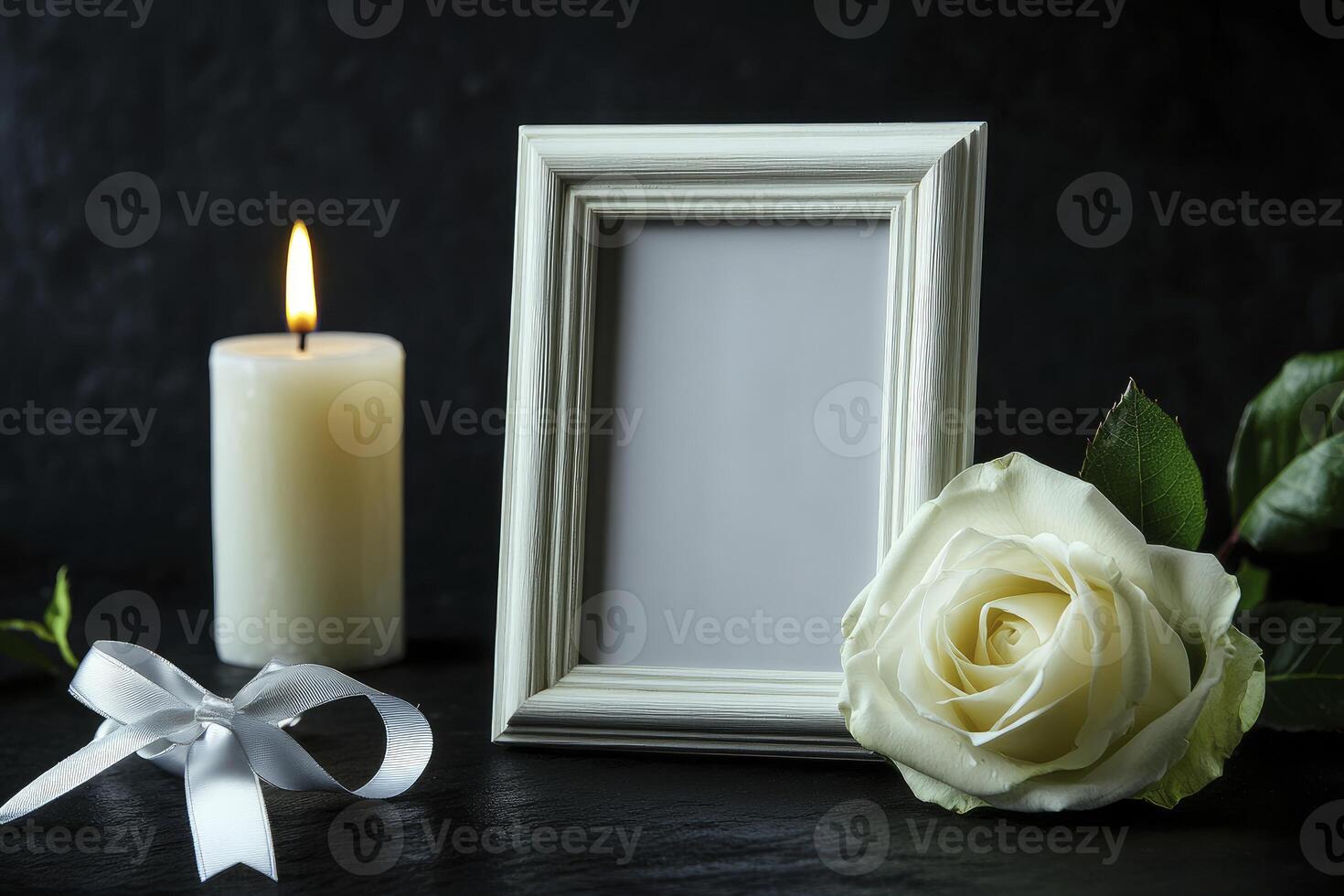 Memorial Still Life with Empty Frame Candle Rose and Ribbon photo