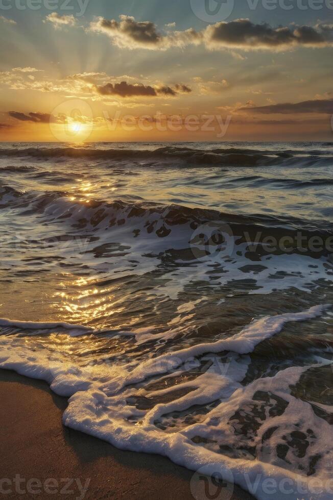 Ocean Waves Crashing on Beach at Sunset with Golden Light photo