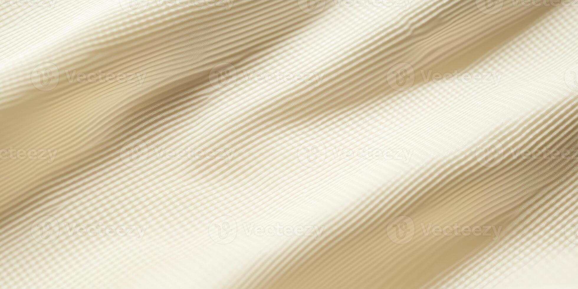 Close-up Cream Waffle Fabric Texture with Soft Waves and Subtle Lines photo