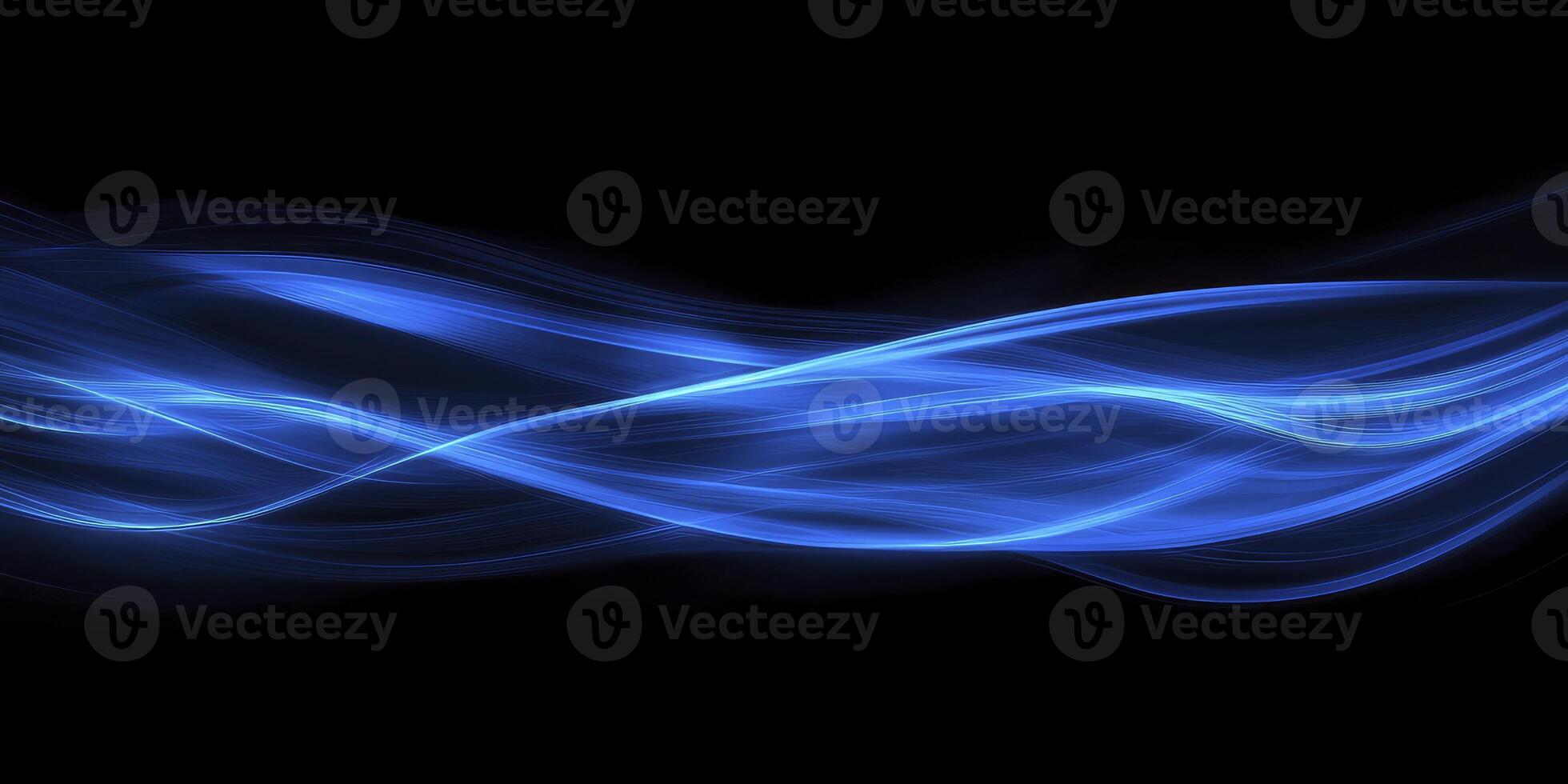 Abstract Blue Light Streaks Flowing Across a Black Background Image photo