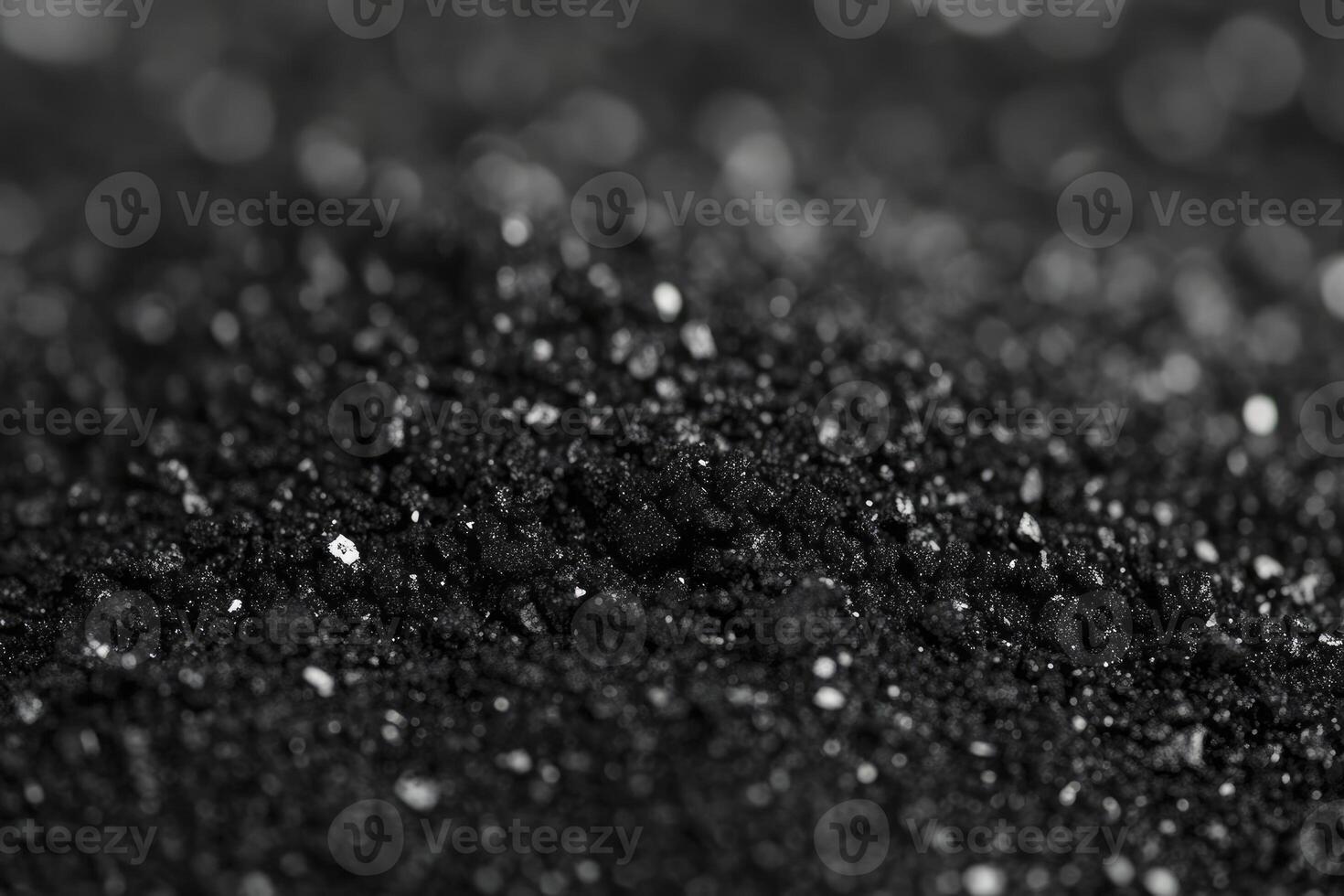Close-up of Dark Fine Powder Texture with Glimmering Particles Background photo