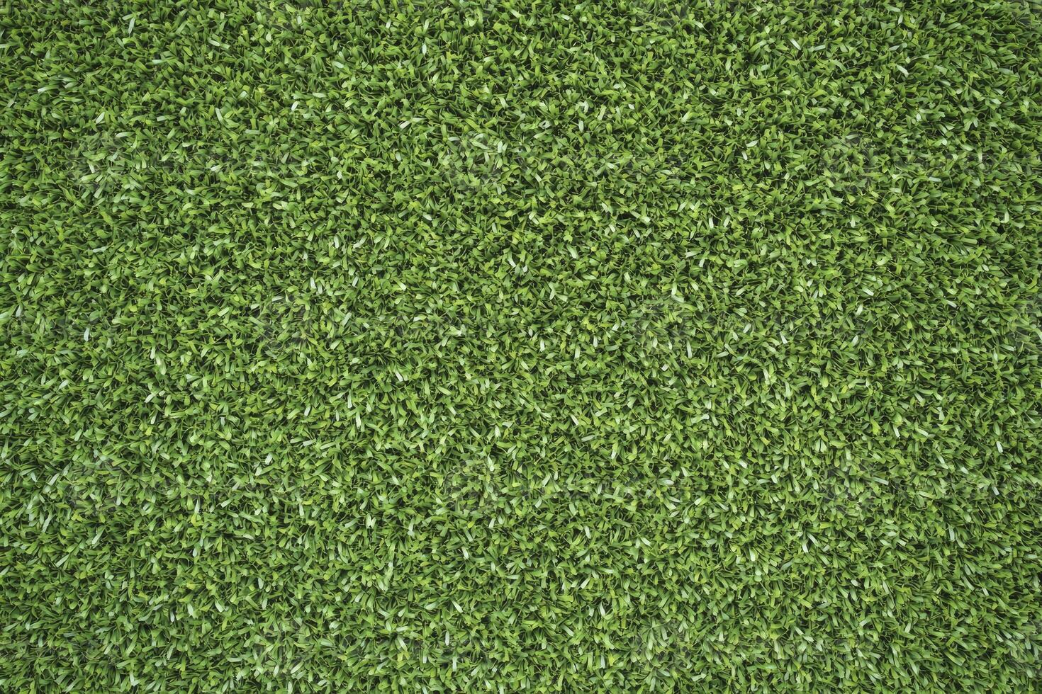 Artificial Green Grass Texture Background Full Frame Top View photo