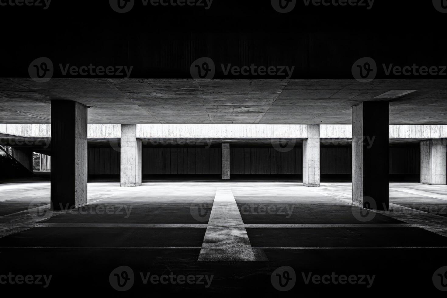 Empty Parking Garage with Concrete Columns and Graphic Lines in Black and White photo