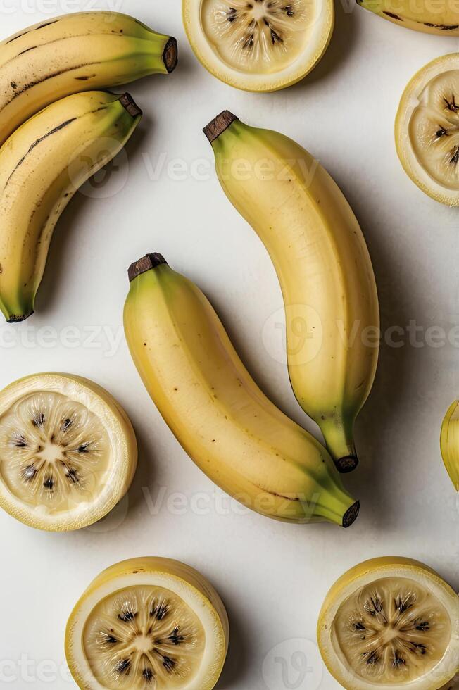 Arrangement of Bananas and Lemon Slices on a Light Surface photo