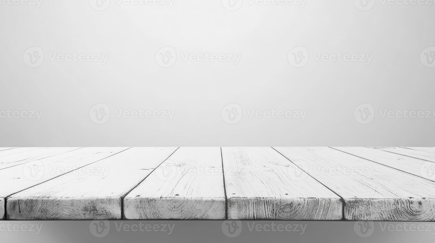 Empty White Wooden Table Against Plain Gray Background for Product Display photo