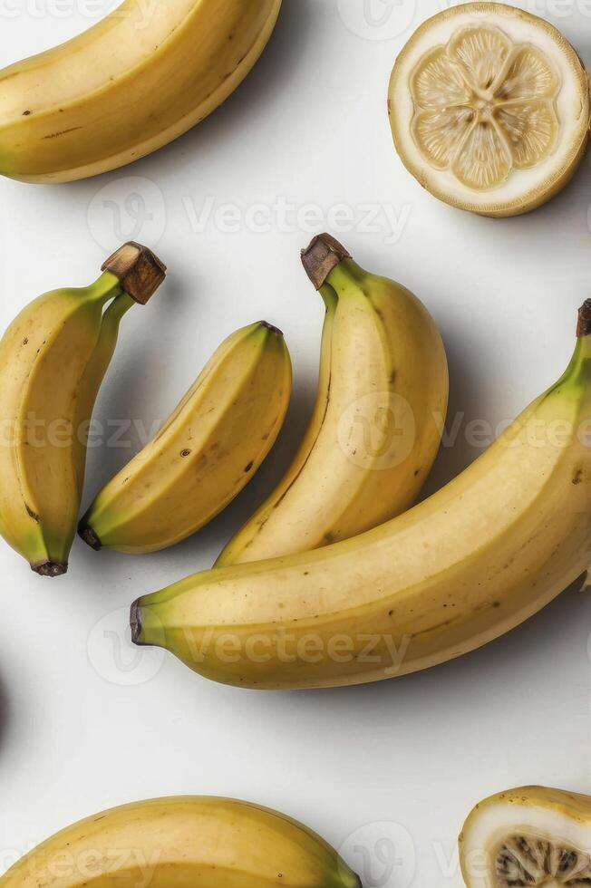 Arrangement of Fresh Bananas and Lemon Slice on White Surface photo
