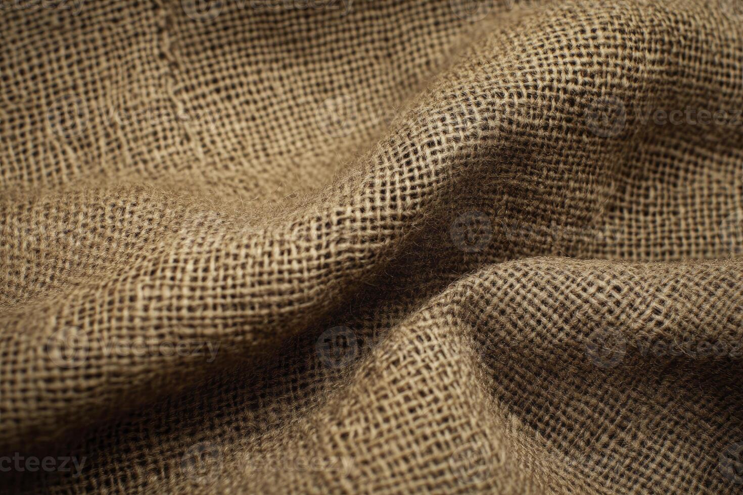 Close-up Woven Burlap Fabric Texture with Natural Fibers and Earthy Tones photo
