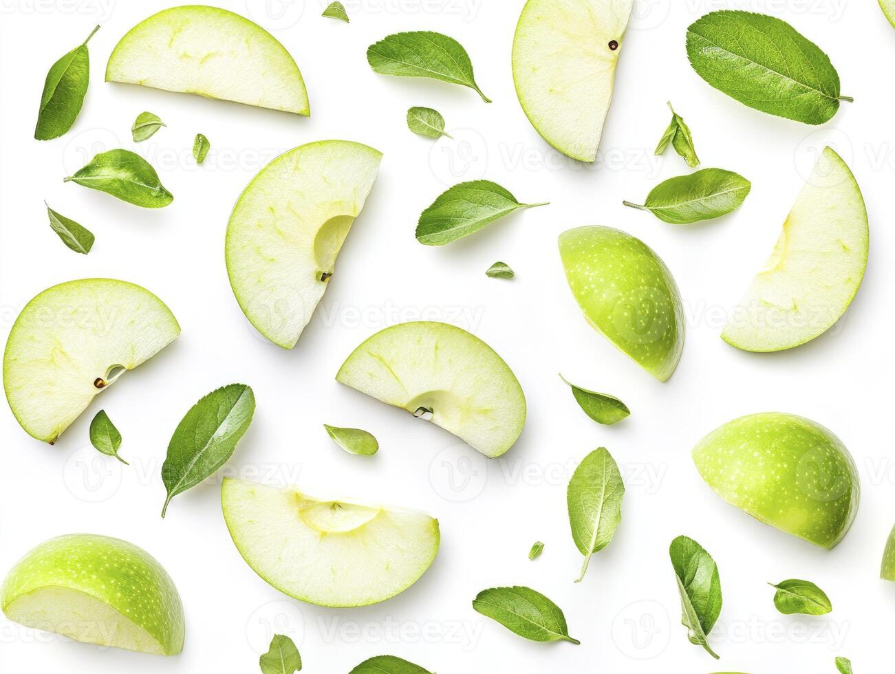 Green Apple Slices with Fresh Leaves on a White Background Pattern photo