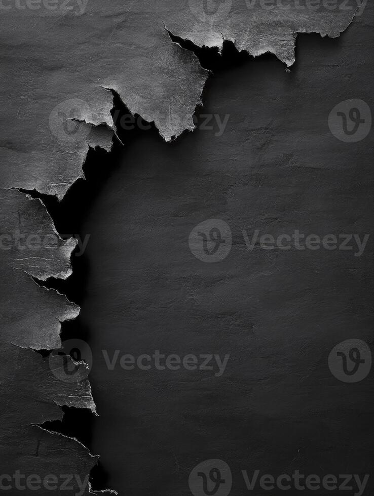 Torn Black Paper Revealing Texture and Depth for Creative Design Projects photo