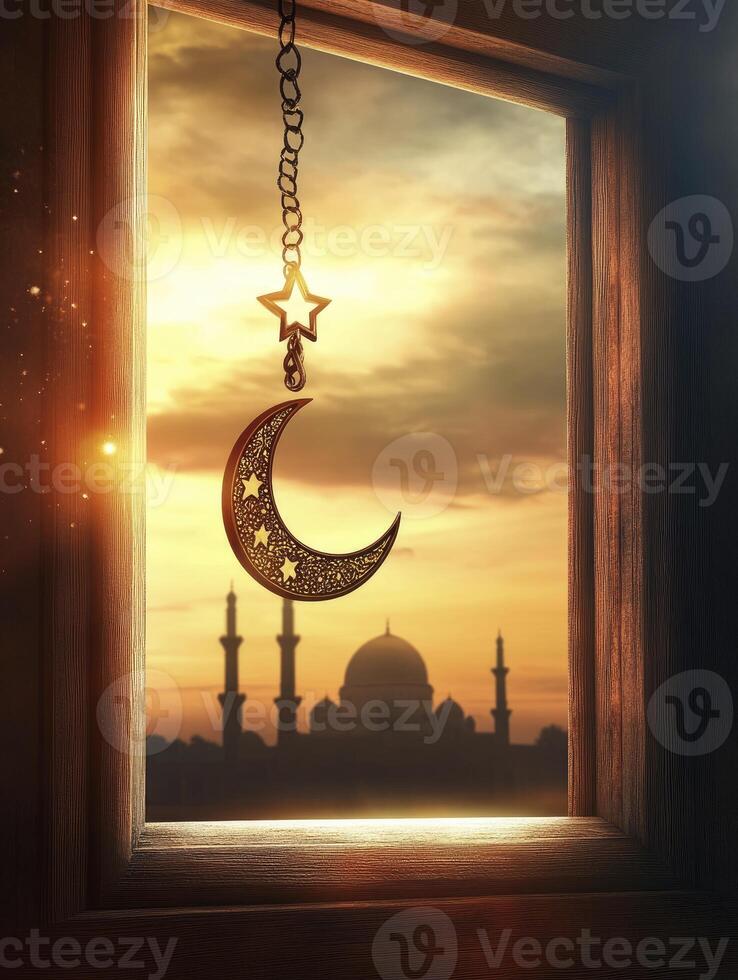Hanging Moon Star Ornament with Mosque View From Window at Sunset photo