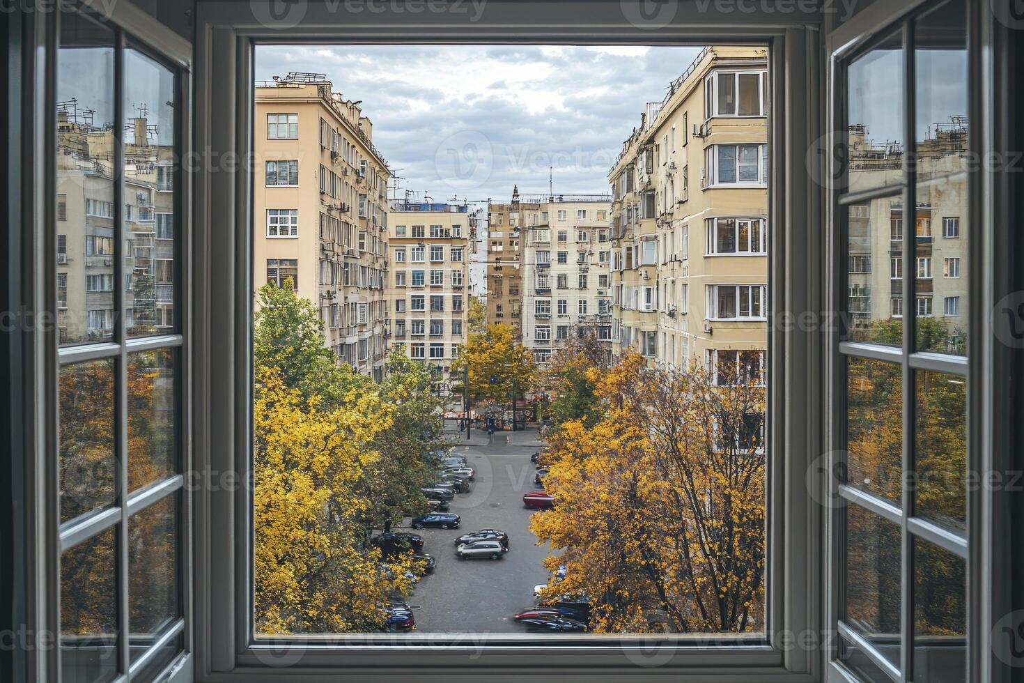 City Street View From Open Window with Autumn Foliage in Fall photo