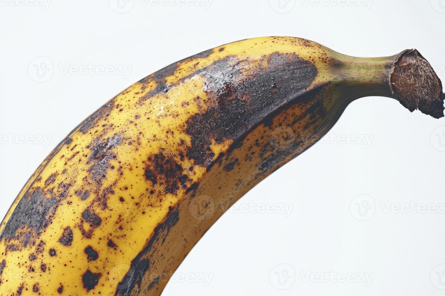 Close Up of a Ripe Banana Showing Spots on Peel photo