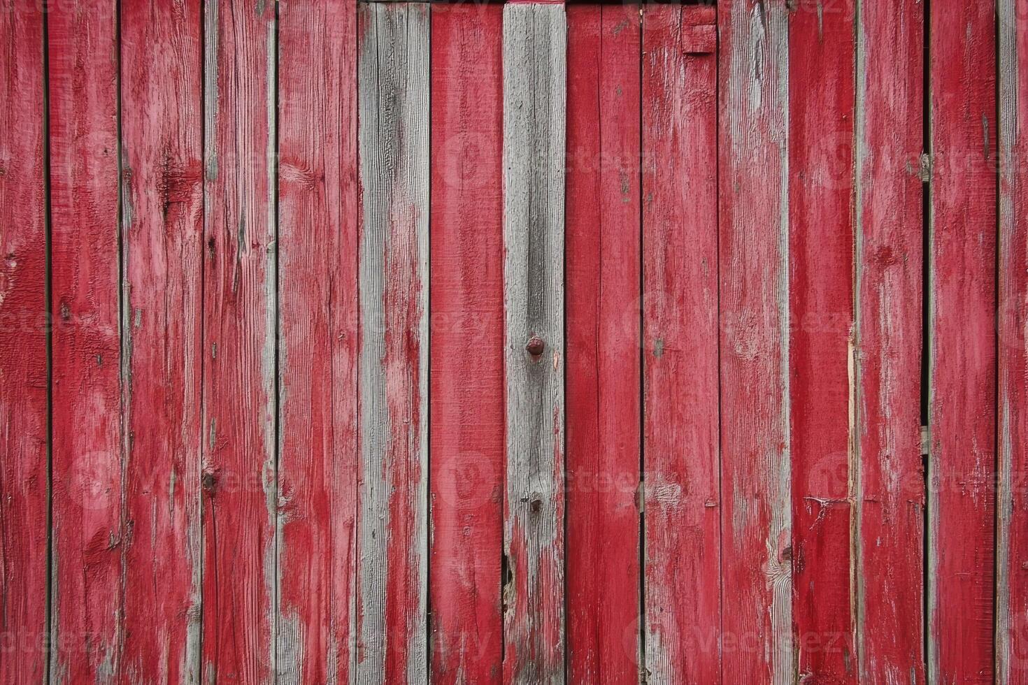 Red Painted Wooden Fence with Weathered Texture for Rustic Background photo