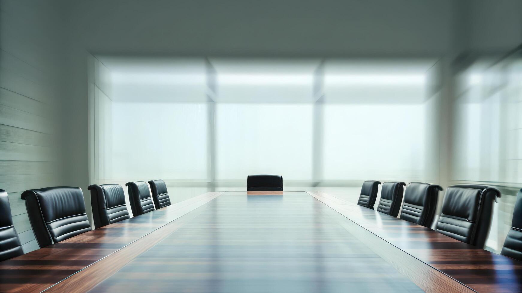 A conference table with black chairs in front of a large window photo