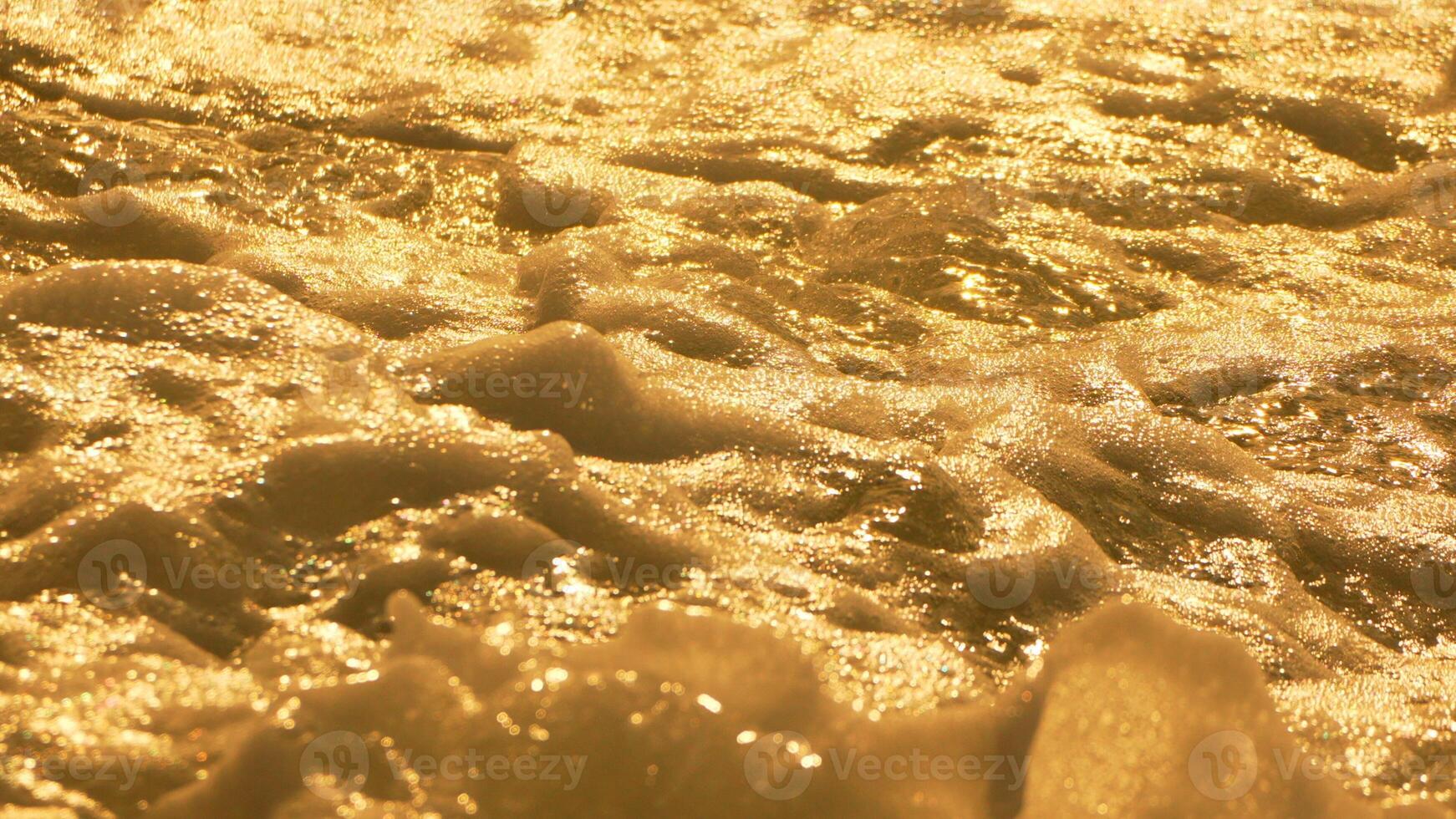 Cave Wall Texture Gold Rock - A close-up of a gold-colored cave wall with a textured surface. photo