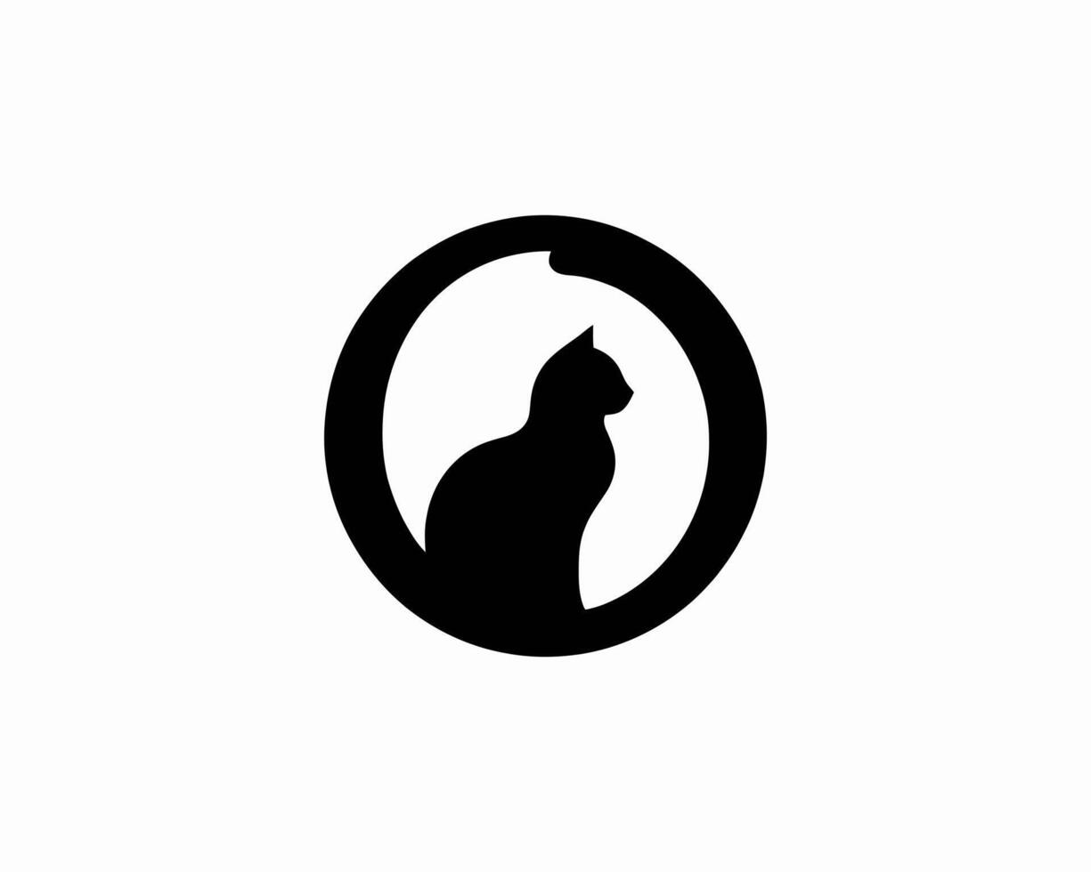 A black and white silhouette of a cat in a circle vector