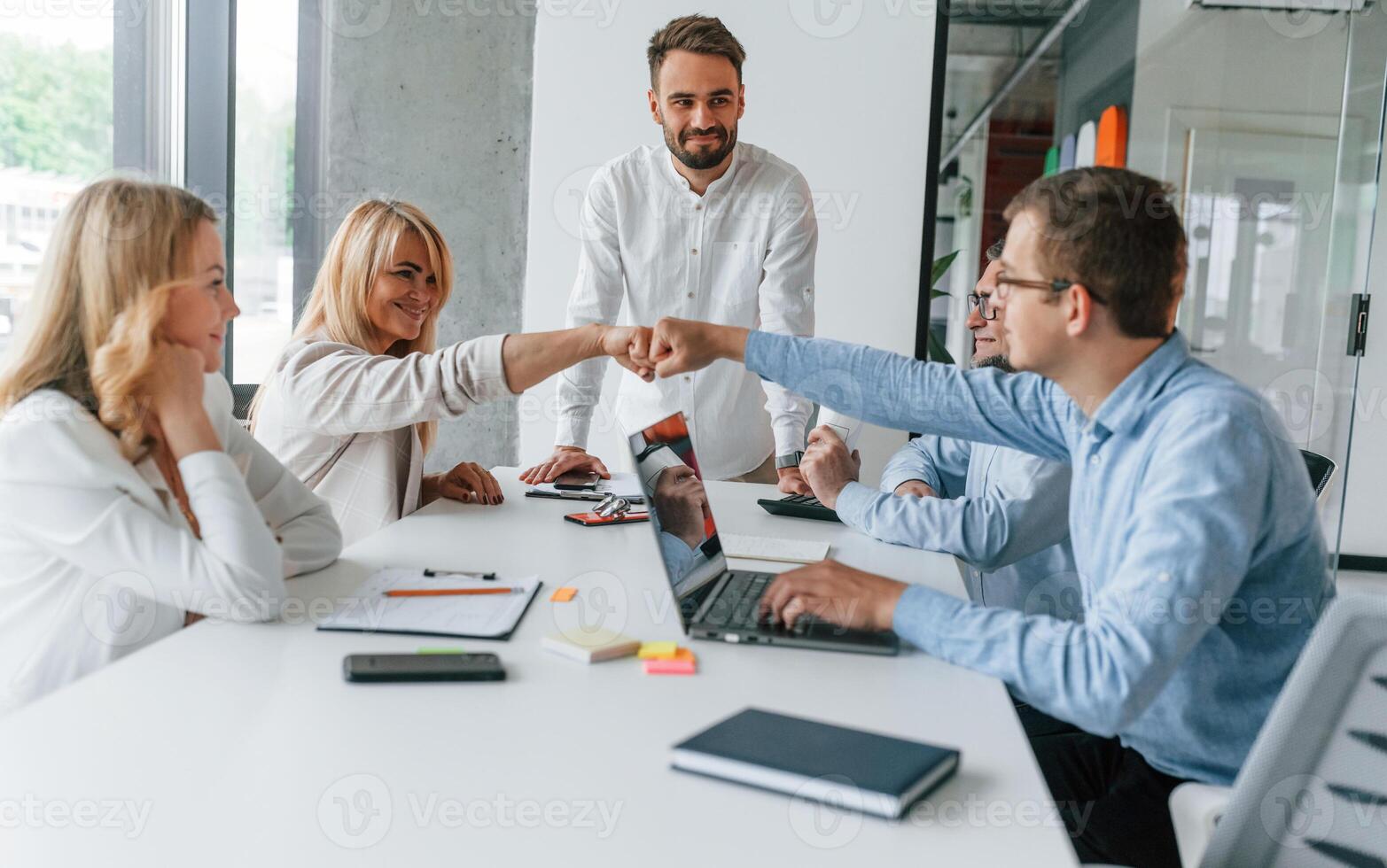 Successful teamwork. Group of professional business people is in the office photo