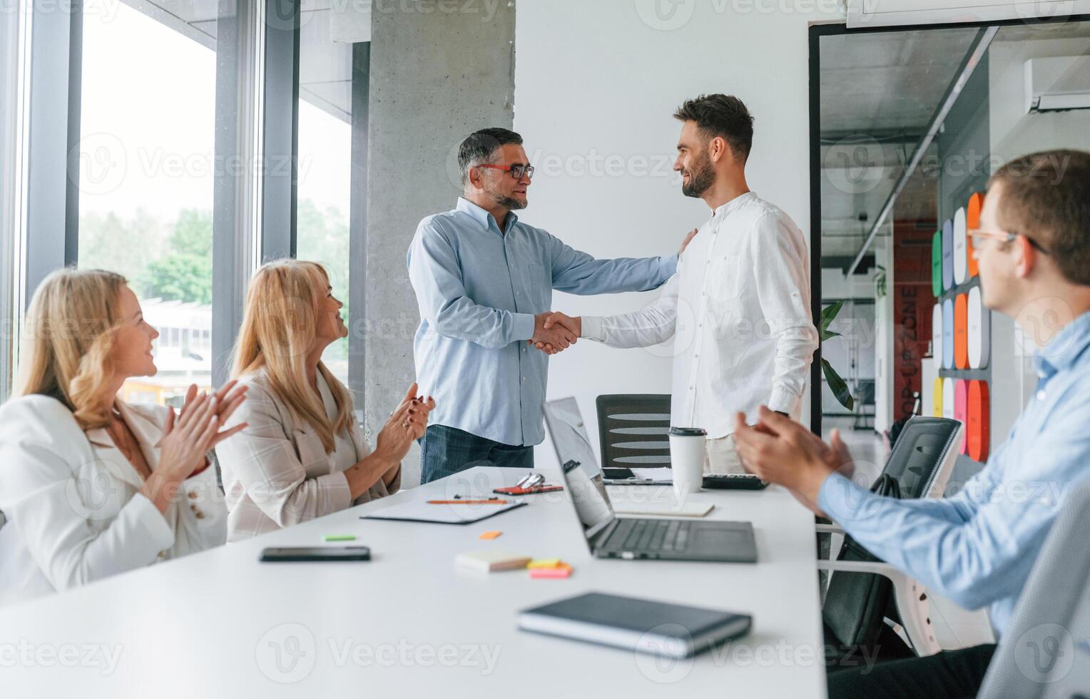 Successful teamwork... Group of professional business people is in the office photo