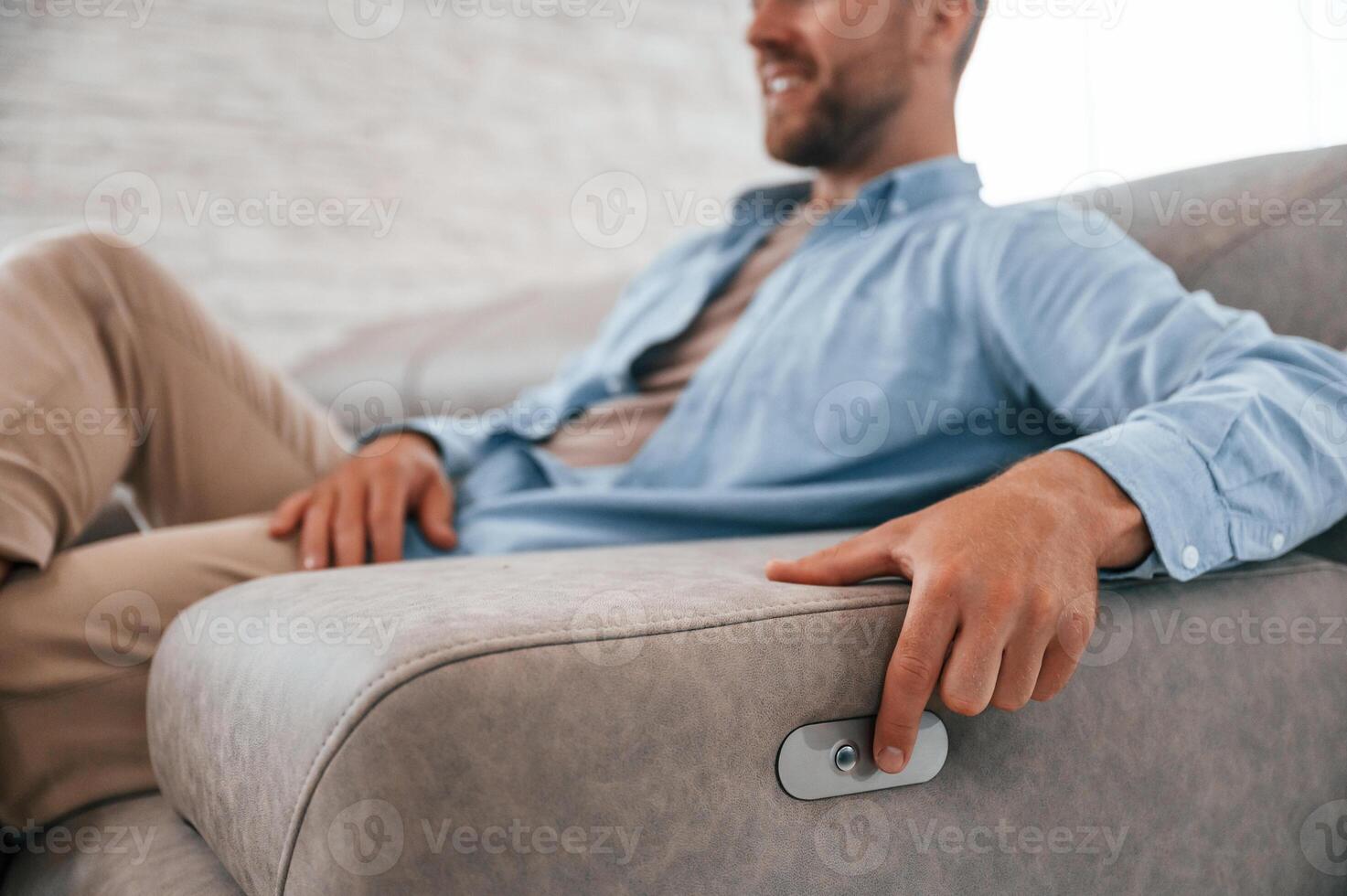 Trying ,automatic switches. Customer visiting the sofa and bed store. Looking for update photo