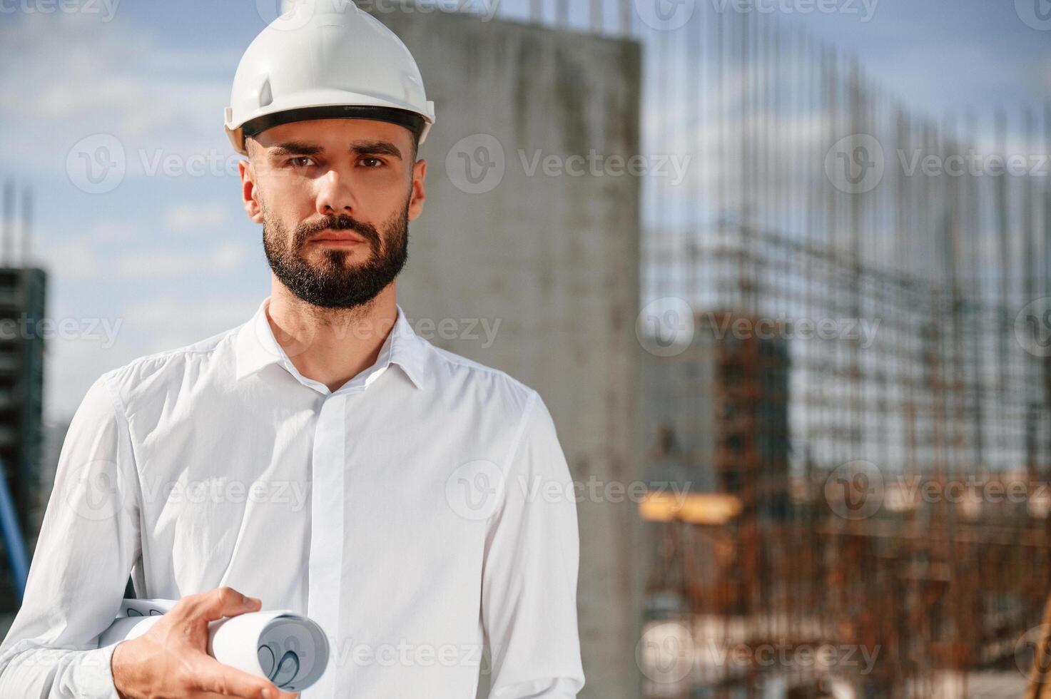 Portrait, of man that is in uniform on the ,construction site photo