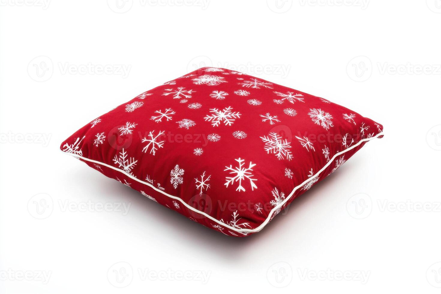 A red pillow with snowflakes on it photo