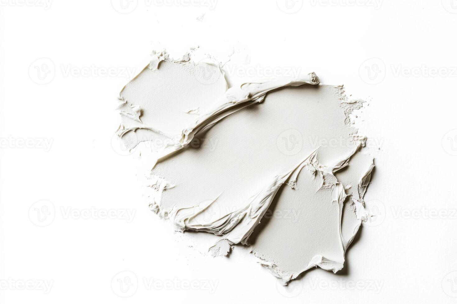 A piece of white paint on a white surface photo