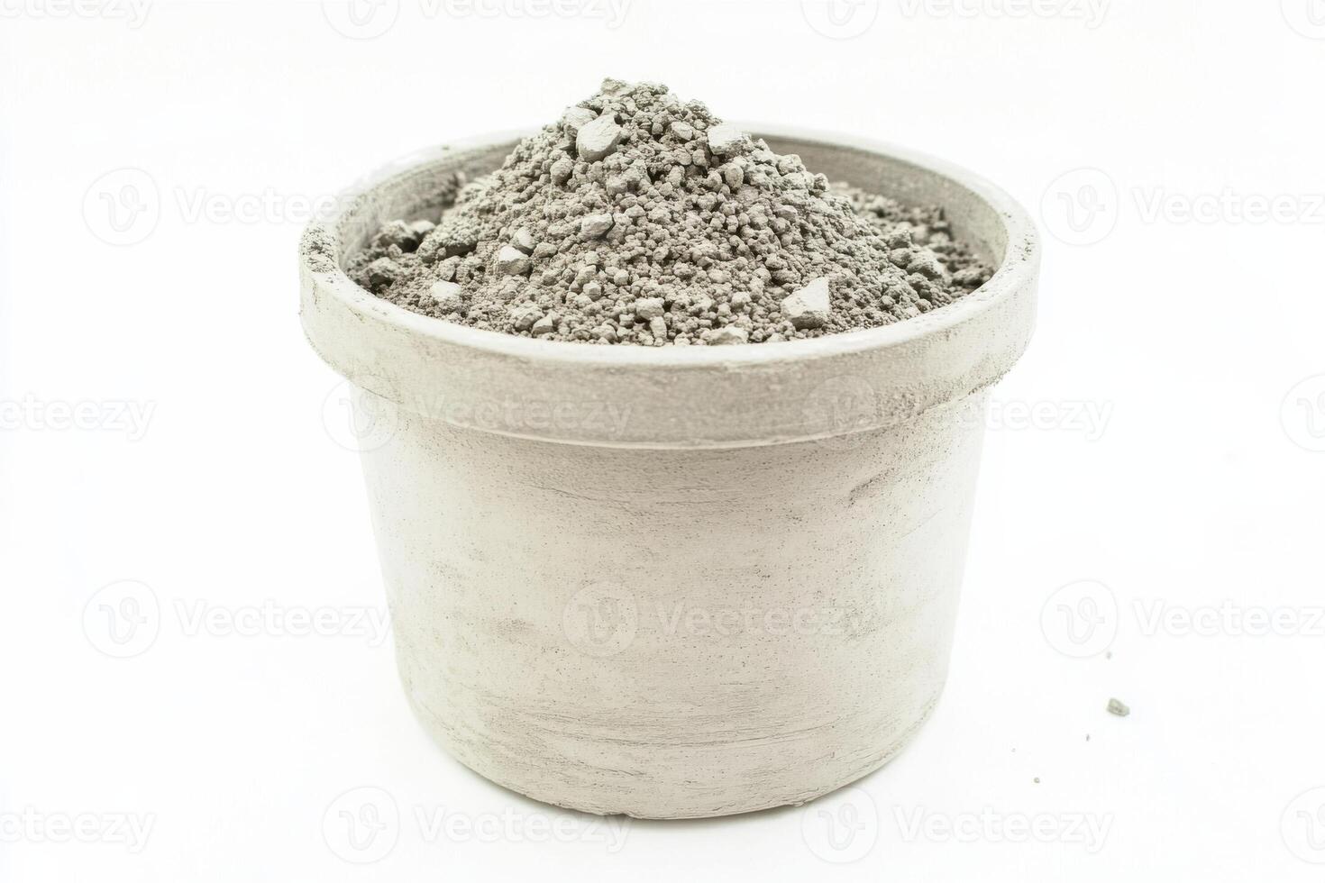 A cement pot filled with cement on a white background photo