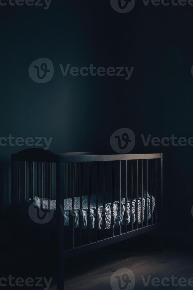 A dark room with a crib in it photo