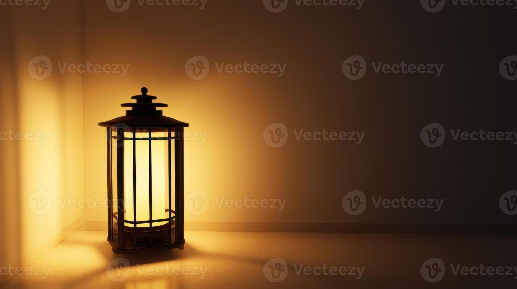 A lamp is lit in a dark room photo
